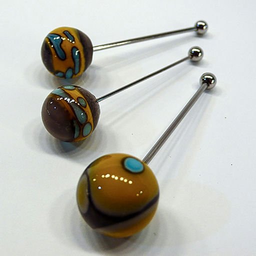 Design ball piercing earrings